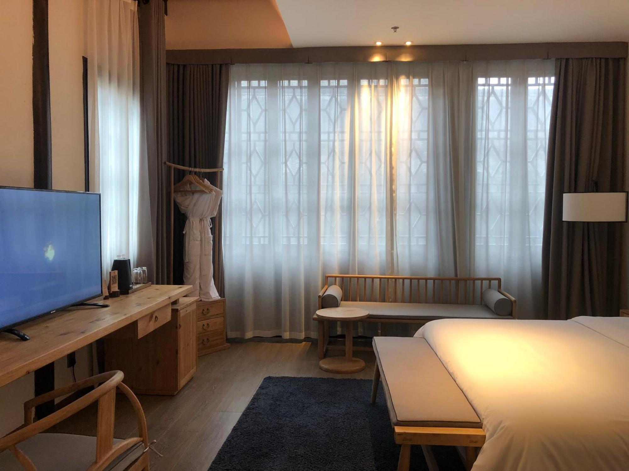 Uin Oriental Hotel Уси Экстерьер фото