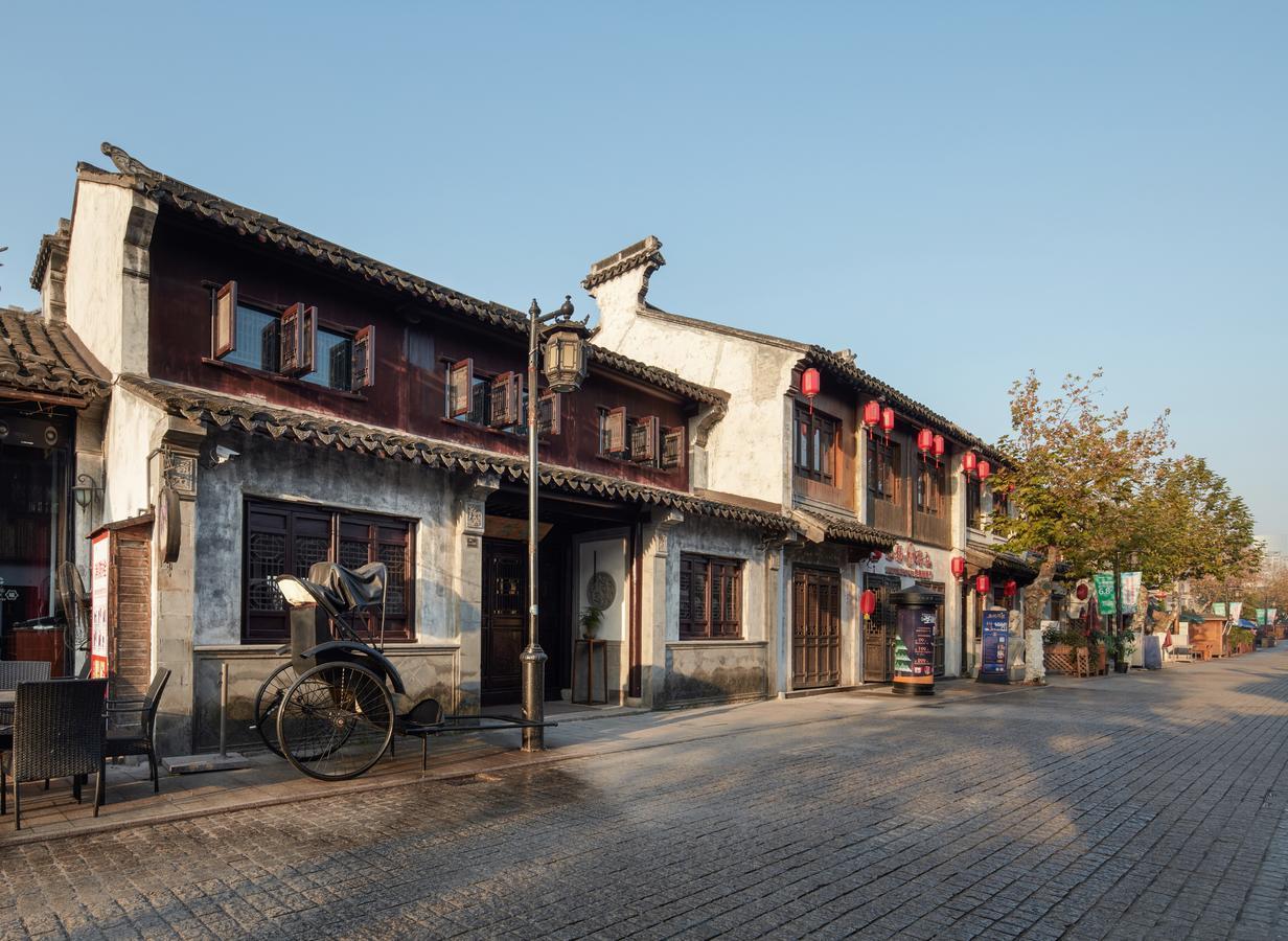 Uin Oriental Hotel Уси Экстерьер фото